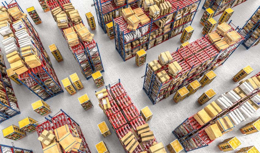 Human efficiently sorting and moving goods in a Euroroute Logistics warehouse, demonstrating automation in action